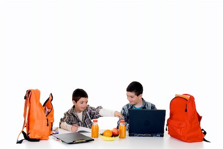 school food bag - two young boys doing together studying and homework Stock Photo - Budget Royalty-Free & Subscription, Code: 400-04033008