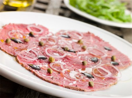 simsearch:400-04031652,k - Carpaccio of Beef Fillet with Rocket salad Stock Photo - Budget Royalty-Free & Subscription, Code: 400-04033279