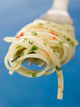 simsearch:400-04031652,k - Chilli and Coriander Linguine twisted around a fork Stock Photo - Budget Royalty-Free & Subscription, Code: 400-04033285