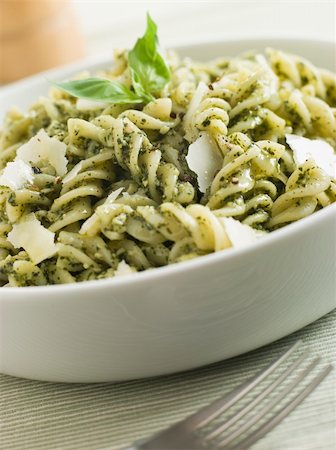 simsearch:400-04031652,k - Bowl of Fusilli Pasta dressed in Pesto with Parmesan Shaves Stock Photo - Budget Royalty-Free & Subscription, Code: 400-04033309