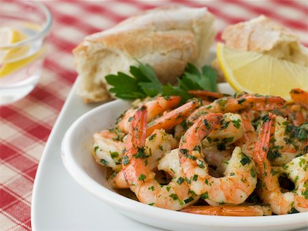simsearch:400-05939167,k - Dish of Garlic Buttered Tiger Prawns with Rustic Bread Photographie de stock - Aubaine LD & Abonnement, Code: 400-04033887