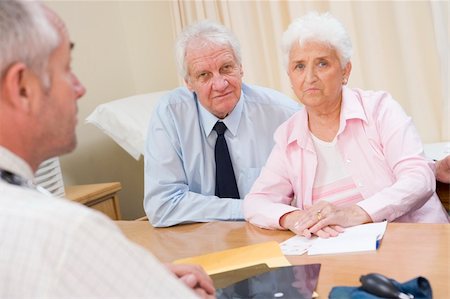 elderly couple concern - Couple in doctor's office frowning Stock Photo - Budget Royalty-Free & Subscription, Code: 400-04044227