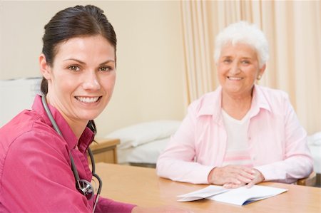 simsearch:400-04021788,k - Woman in doctor's office smiling Stock Photo - Budget Royalty-Free & Subscription, Code: 400-04044242