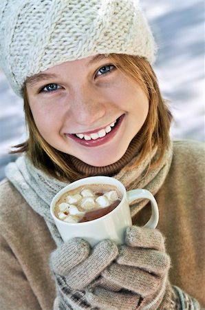 Teenage girl in winter hat with cup of hot chocolate Stock Photo - Budget Royalty-Free & Subscription, Code: 400-04044804