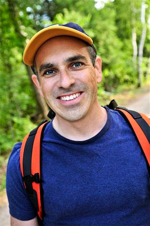 simsearch:400-04997337,k - Portrait of happy middle aged man on a forest trail Stock Photo - Budget Royalty-Free & Subscription, Code: 400-04044871