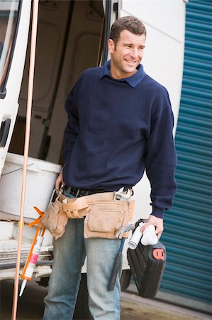 self-employed (male) - Plumber standing with van smiling Stock Photo - Budget Royalty-Free & Subscription, Code: 400-04045091