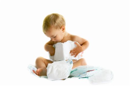 baby playing with diapers over white Stock Photo - Budget Royalty-Free & Subscription, Code: 400-04045729