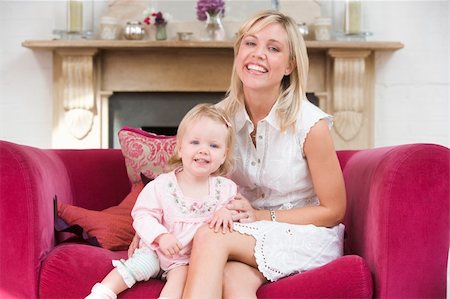 simsearch:400-04045907,k - Mother in living room with baby smiling Stock Photo - Budget Royalty-Free & Subscription, Code: 400-04045805