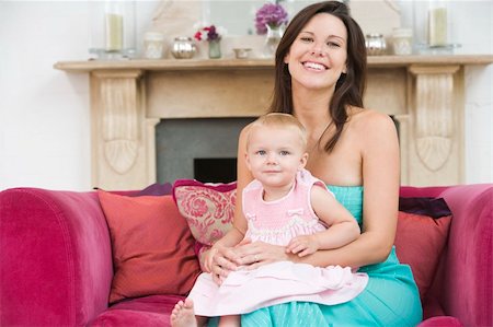 simsearch:400-04045907,k - Mother in living room with baby smiling Stock Photo - Budget Royalty-Free & Subscription, Code: 400-04045814