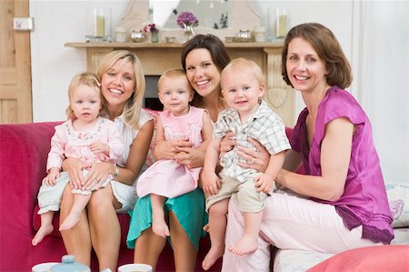 playdate - Three mothers in living room with babies smiling Stock Photo - Budget Royalty-Free & Subscription, Code: 400-04045815