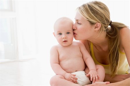 simsearch:400-04045907,k - Mother kissing baby indoors Stock Photo - Budget Royalty-Free & Subscription, Code: 400-04045867