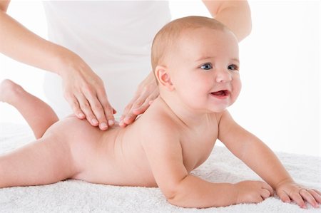 full body massage - Mother massaging baby Stock Photo - Budget Royalty-Free & Subscription, Code: 400-04045939