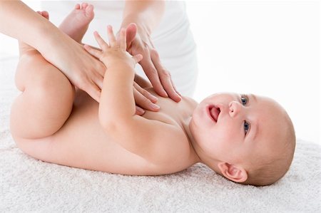 full body massage - Mother massaging baby Stock Photo - Budget Royalty-Free & Subscription, Code: 400-04045940