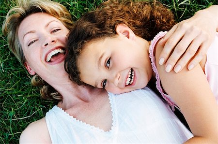 simsearch:400-04043055,k - Mother and daughter outdoors smiling Stock Photo - Budget Royalty-Free & Subscription, Code: 400-04046012