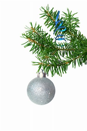 simsearch:400-04653794,k - Fir tree branch with silver ball on a white background. Photographie de stock - Aubaine LD & Abonnement, Code: 400-04046710