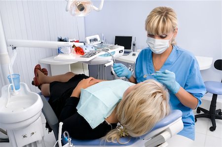 doctor works with patient in the dentist office Stock Photo - Budget Royalty-Free & Subscription, Code: 400-04047132