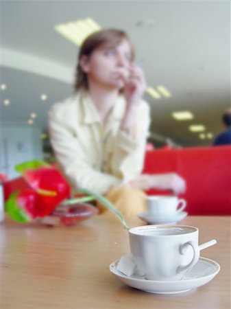 Sad woman sitting at the café Stock Photo - Budget Royalty-Free & Subscription, Code: 400-04047147