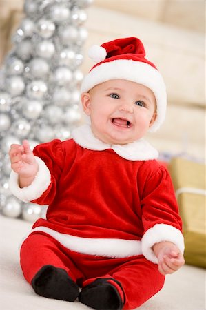 Baby In Santa Costume At Christmas Stock Photo - Budget Royalty-Free & Subscription, Code: 400-04048025