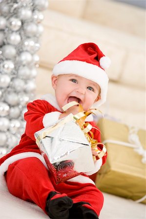 Baby In Santa Costume At Christmas Stock Photo - Budget Royalty-Free & Subscription, Code: 400-04048023