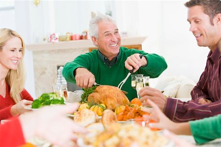 simsearch:400-04888522,k - Family All Together At Christmas Dinner Stock Photo - Budget Royalty-Free & Subscription, Code: 400-04048104