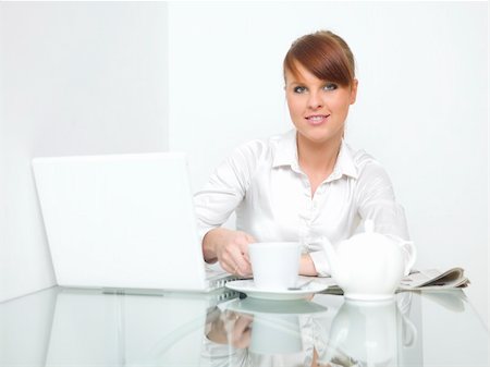 simsearch:400-03996848,k - Business woman is working and drinking cofee Fotografie stock - Microstock e Abbonamento, Codice: 400-04048403