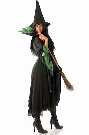 beautiful witch with hat and broom in black and green dress Stock Photo - Budget Royalty-Free & Subscription, Code: 400-04049305