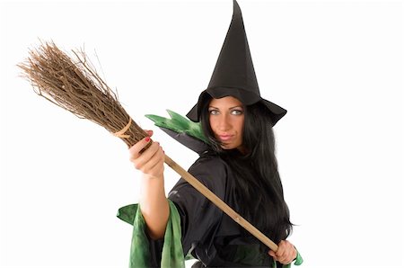 simsearch:400-09132992,k - close up of a cute witch with hat playing with a broom Stock Photo - Budget Royalty-Free & Subscription, Code: 400-04049307