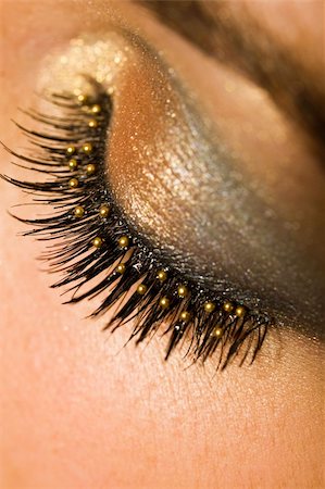 A macro close up of a beautiful woman's made up eye with false eyelashes Stock Photo - Budget Royalty-Free & Subscription, Code: 400-04049303