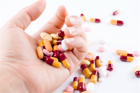 simsearch:400-08796662,k - many pills on hand Stock Photo - Budget Royalty-Free & Subscription, Code: 400-04049342