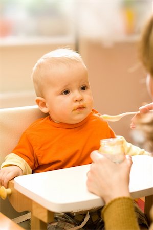 fat family eating pic - Feeding procedure of a little baby boy Stock Photo - Budget Royalty-Free & Subscription, Code: 400-04049802