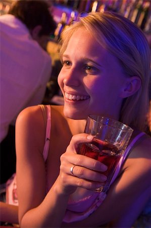 simsearch:400-04040205,k - Young woman drinking at a nightclub Stock Photo - Budget Royalty-Free & Subscription, Code: 400-04040202