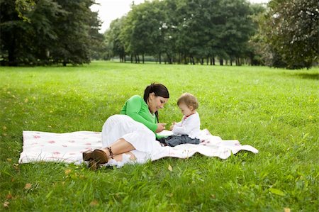 simsearch:400-04612785,k - happy family on green meadow Stock Photo - Budget Royalty-Free & Subscription, Code: 400-04040523