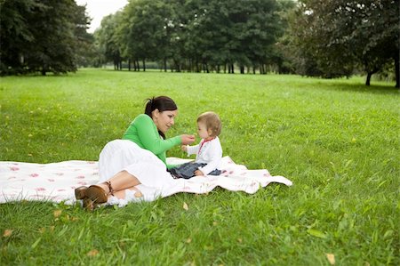 simsearch:400-04612785,k - happy family on green meadow Stock Photo - Budget Royalty-Free & Subscription, Code: 400-04040531