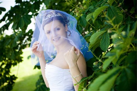 a happy bride near the tree Stock Photo - Budget Royalty-Free & Subscription, Code: 400-04040710