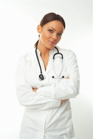 simsearch:400-04526743,k - 20-25 years old beautiful female doctor isolates on white Stock Photo - Budget Royalty-Free & Subscription, Code: 400-04040860