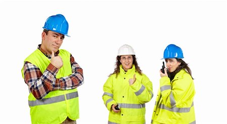 Three construction workers over a white background. Focus at front Stock Photo - Budget Royalty-Free & Subscription, Code: 400-04041185