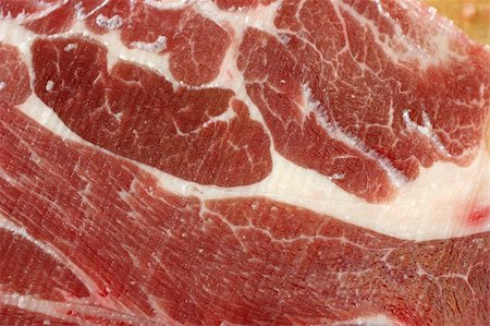 Close up of meat of a chunk of raw Australian lamb with marbling patterns of fat and muscle Photographie de stock - Aubaine LD & Abonnement, Code: 400-04041272