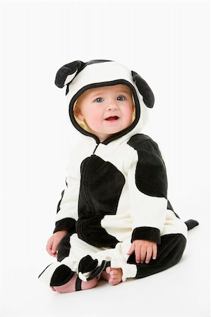 farm girls cows - Baby in cow costume Stock Photo - Budget Royalty-Free & Subscription, Code: 400-04041794