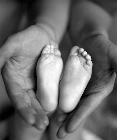 supporter foot - Parents hands hold baby boy legs Stock Photo - Budget Royalty-Free & Subscription, Code: 400-04041856