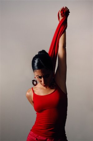 simsearch:400-09224249,k - Artistic portrait of young hispanic dancer woman in red clothes Foto de stock - Royalty-Free Super Valor e Assinatura, Número: 400-04042279