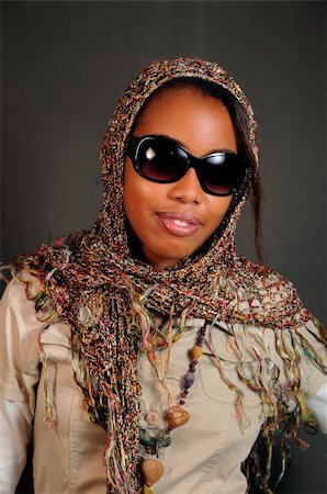 simsearch:400-04542798,k - Portrait of young african female model posing with sunglasses Foto de stock - Super Valor sin royalties y Suscripción, Código: 400-04042286