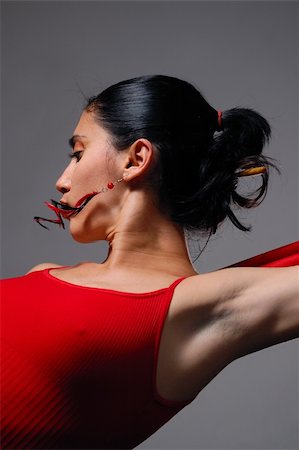 simsearch:400-09224249,k - Artistic portrait of young hispanic dancer woman in red clothes Foto de stock - Royalty-Free Super Valor e Assinatura, Número: 400-04042280