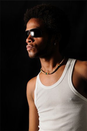 simsearch:400-04163139,k - Portrait of young trendy african man with attitude Photographie de stock - Aubaine LD & Abonnement, Code: 400-04042296
