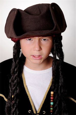 rogues - Young boy wearing a pirate's costume Stockbilder - Microstock & Abonnement, Bildnummer: 400-04042444