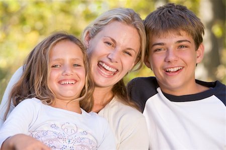 simsearch:400-04038226,k - Woman and two young children outdoors laughing Foto de stock - Super Valor sin royalties y Suscripción, Código: 400-04042767