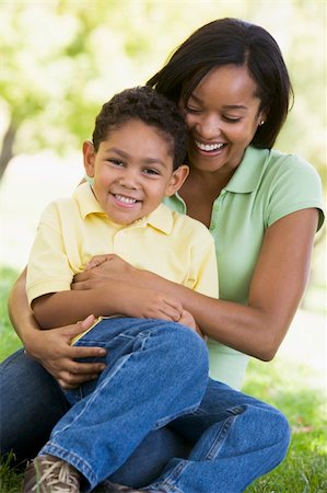 simsearch:400-04043055,k - Woman and young boy outdoors embracing and smiling Stock Photo - Budget Royalty-Free & Subscription, Code: 400-04042851