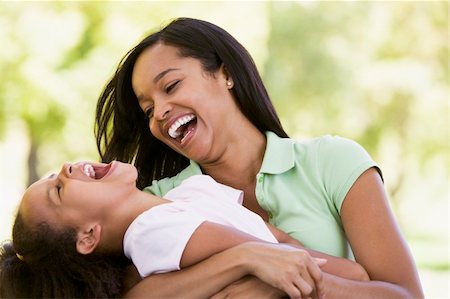 simsearch:400-04046012,k - Woman and young girl outdoors embracing and laughing Stockbilder - Microstock & Abonnement, Bildnummer: 400-04042852