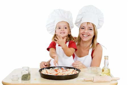 family cheese - Proud little girl making her first pizza with her mother - isolated Stock Photo - Budget Royalty-Free & Subscription, Code: 400-04043014