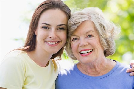 simsearch:400-04043055,k - Two women outdoors embracing and smiling Stock Photo - Budget Royalty-Free & Subscription, Code: 400-04043050