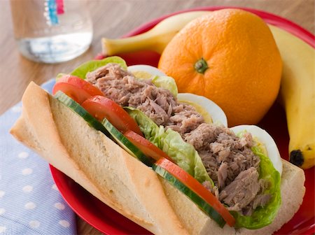 Tuna Egg and Salad Baguette with Fresh Fruit Stock Photo - Budget Royalty-Free & Subscription, Code: 400-04043219